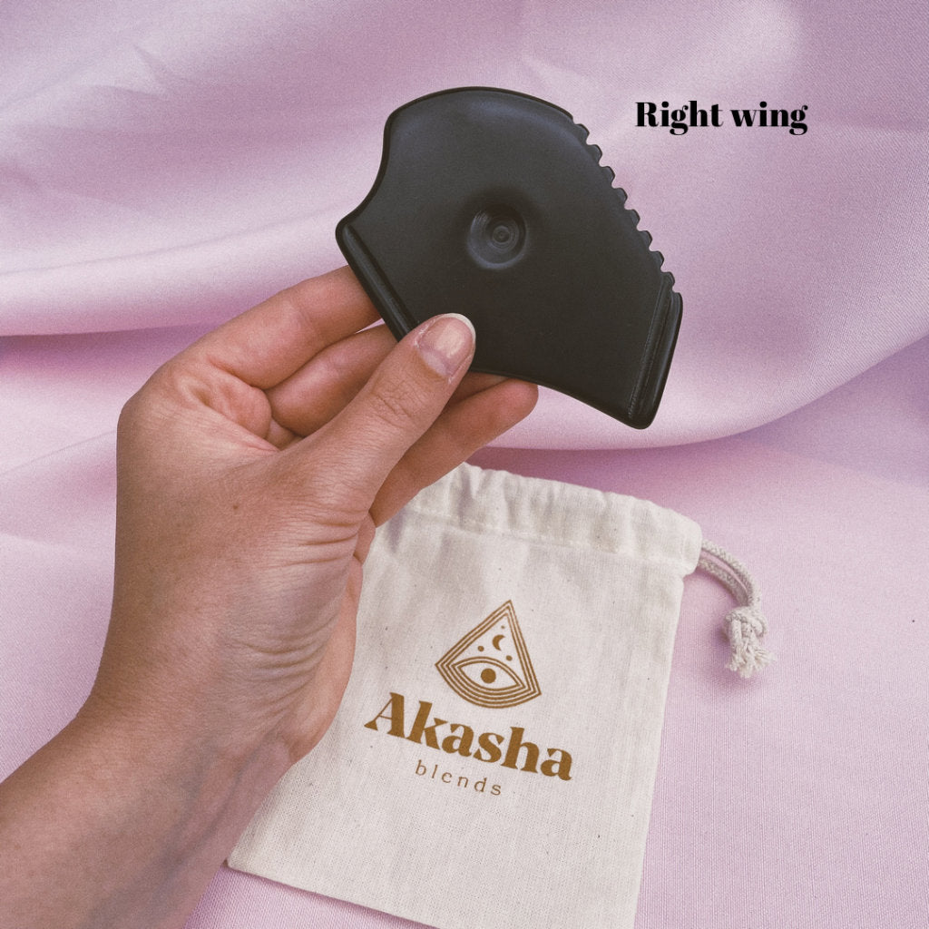 Akasha blends Bianstone Guasha board right wing on pink background