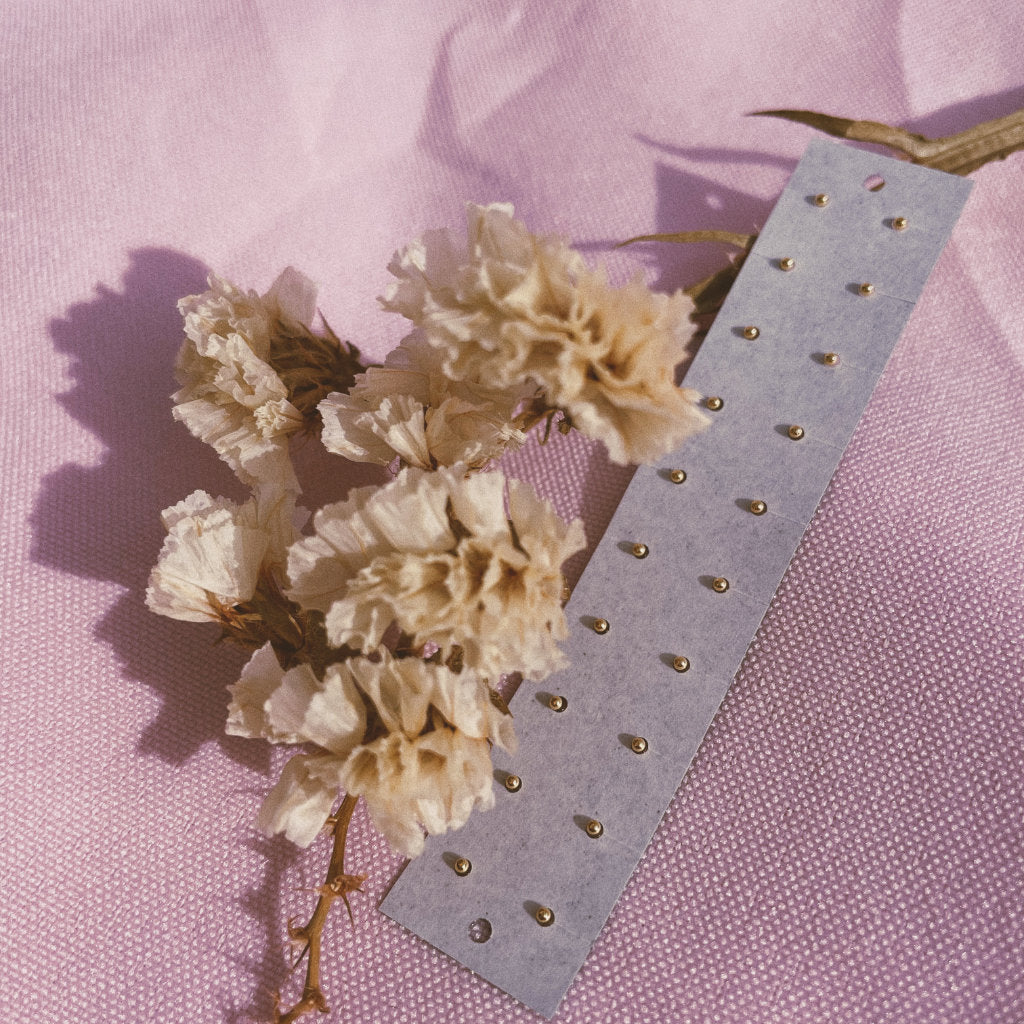 Ear seeds refill by Akasha blends in pink background
